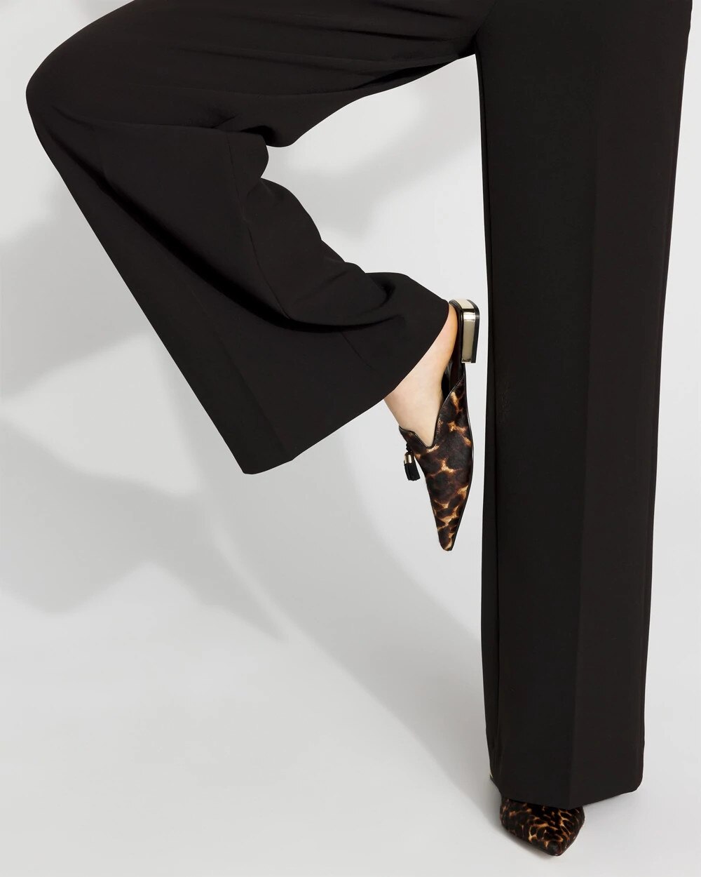 WHBM_Leopard20Tassel20Mule_570397356_BLK000920_OF_MAIN.jpeg
