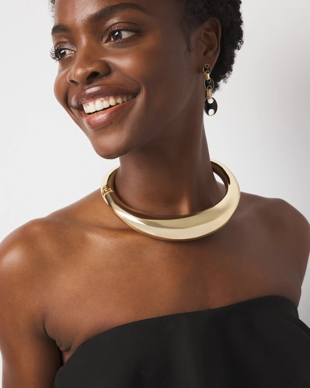 WHBM_NK20Gld20Sculptural20Collar_570393080_TAN000932_OF_MAIN-1.jpeg