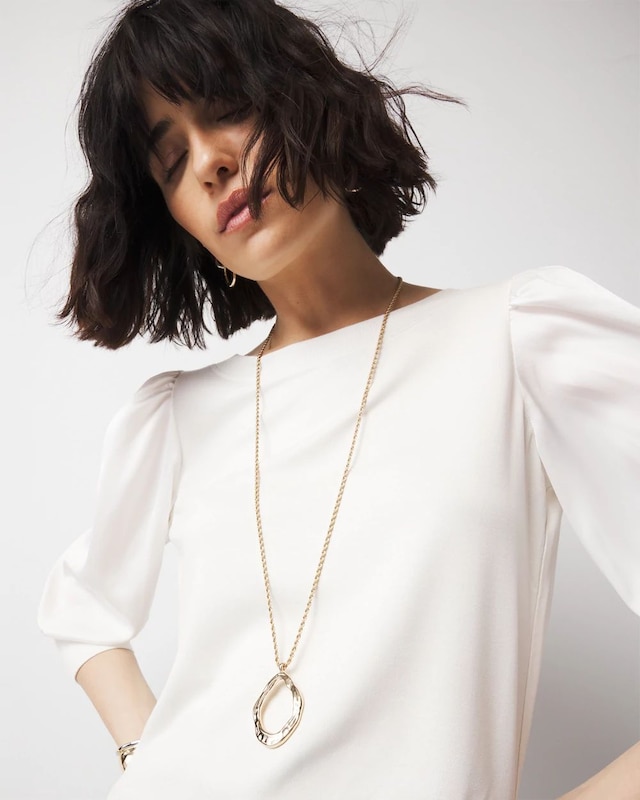 WHBM_NK20Gld20Sculptural20Pdnt_570383205_TAN000932_OF_MAIN.jpeg