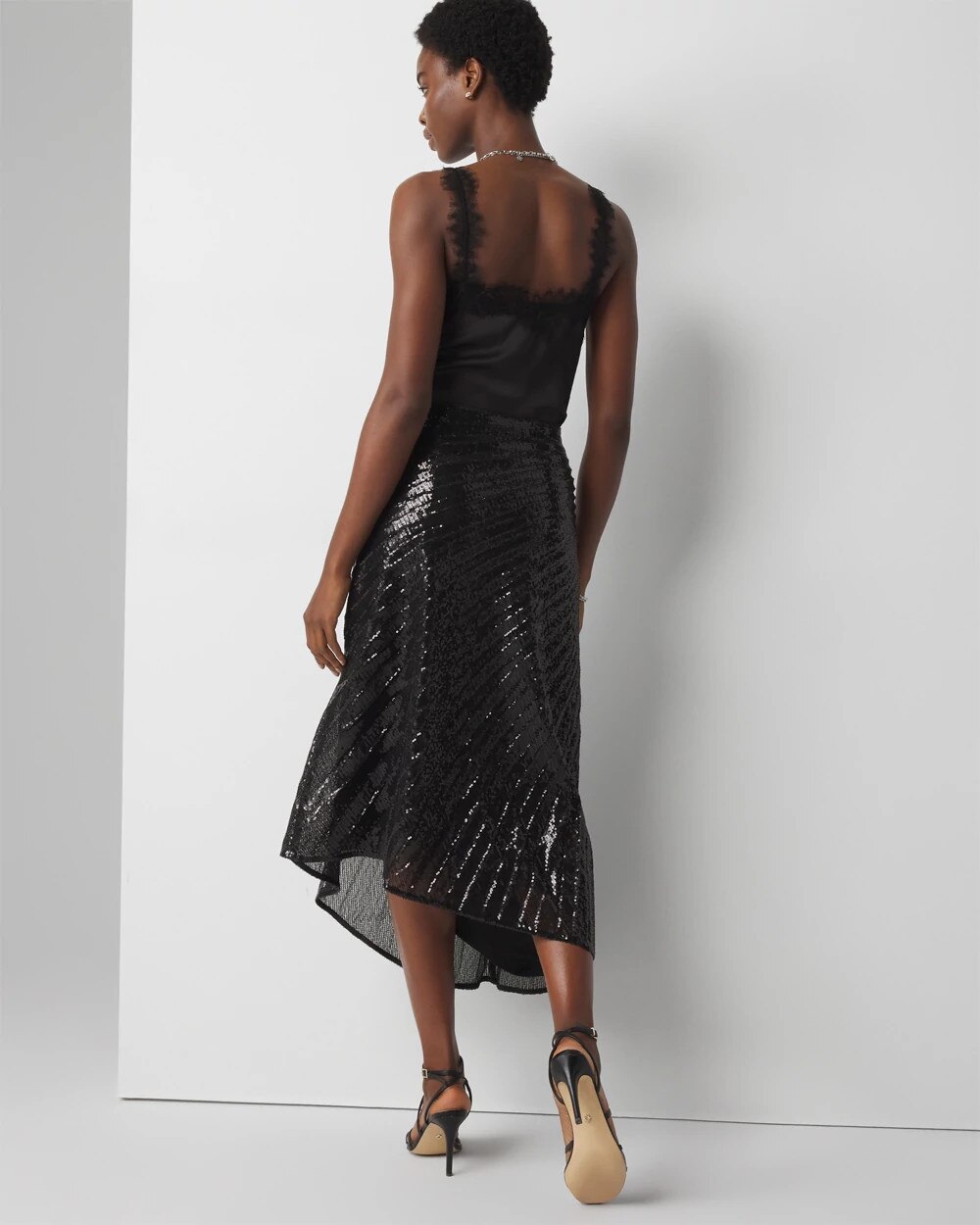 WHBM_Sequin20Asymm20Skirt_570378556_BLK005533_OF_ALT203.jpeg